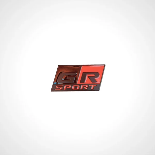 Toyota GR Emblem with sleek red and black design for Toyota performance cars available in Qatar.