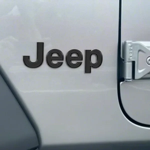 Jeep emblem, genuine badge for off-road vehicles, available in Qatar.