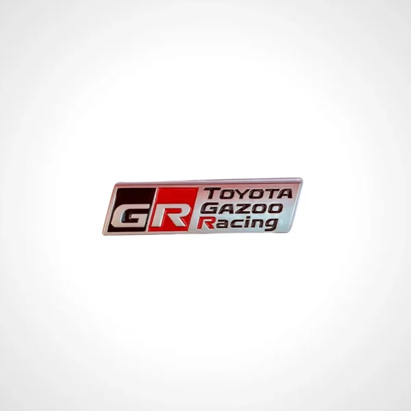 Toyota GR Emblem with sleek red and black design for Toyota performance cars available in Qatar.